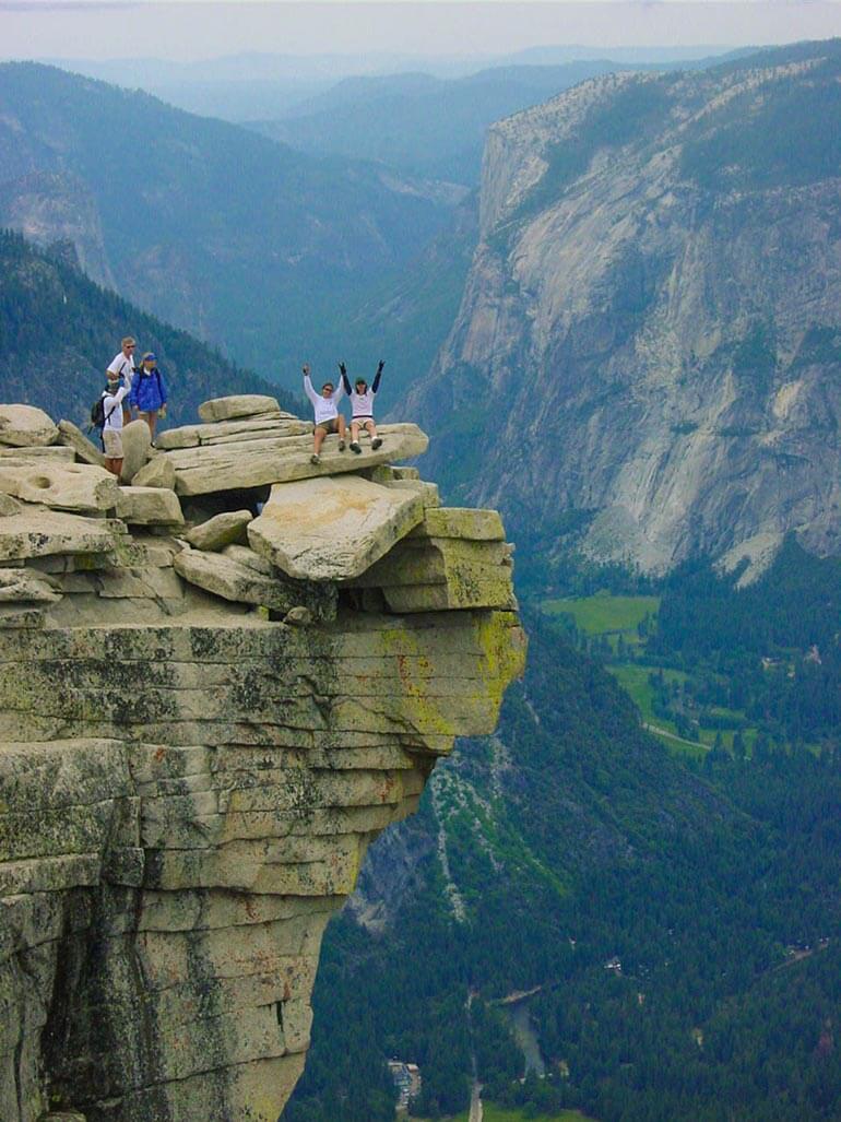 On the edge of Half Dome summit