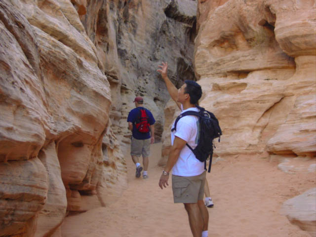 Exploring a sandy slot canyon in Valley of Fire State Park