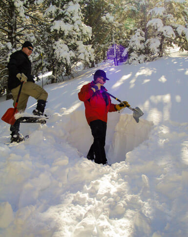 Digging a snow shelter