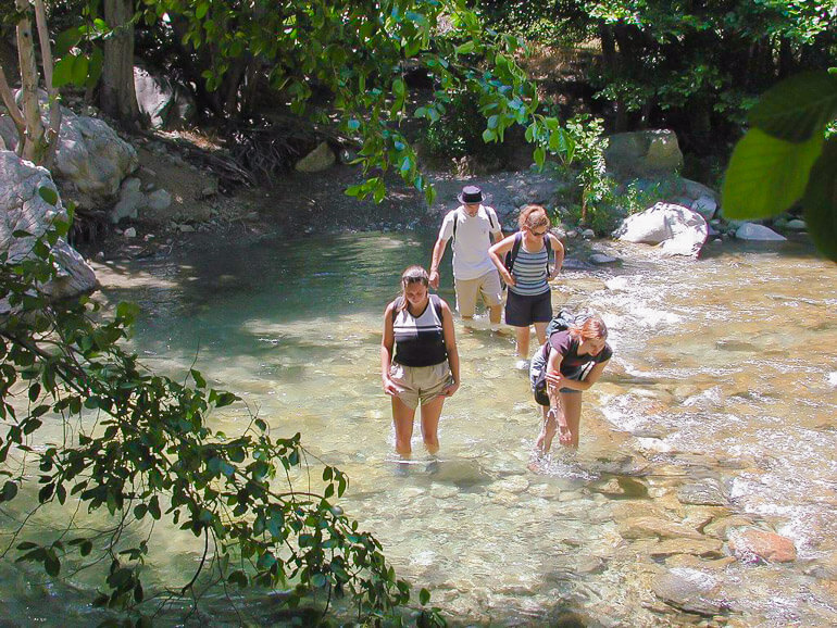 Crossing a stream on Bridge To Nowhere hike