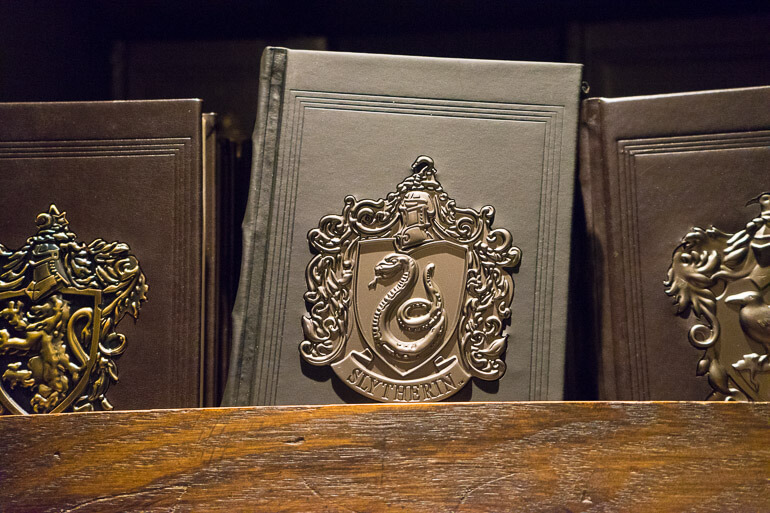 Slytherin crest bound notebook