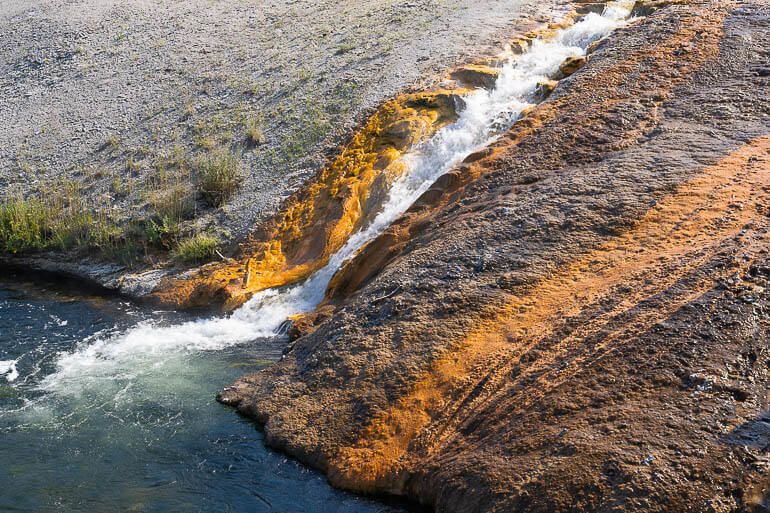 Hot springs pouring into Firehole River